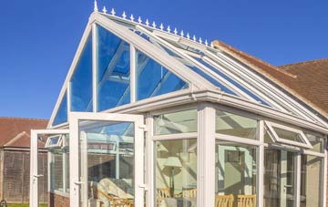 conservatory roof insulation costs East Combe